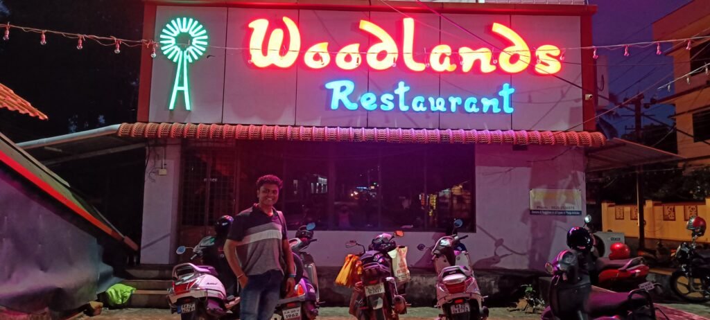 Avinash Kamath infront of Woodlands Restaurant, Udupi